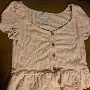 I’m selling a crop top the brand sunset & sixth size large the color pink